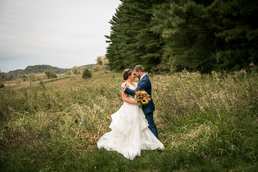 Prairie landscape with bride and groom