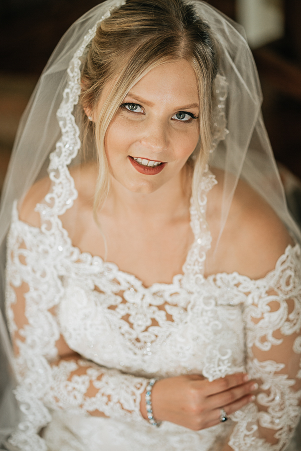 Bride with lace wedding gown