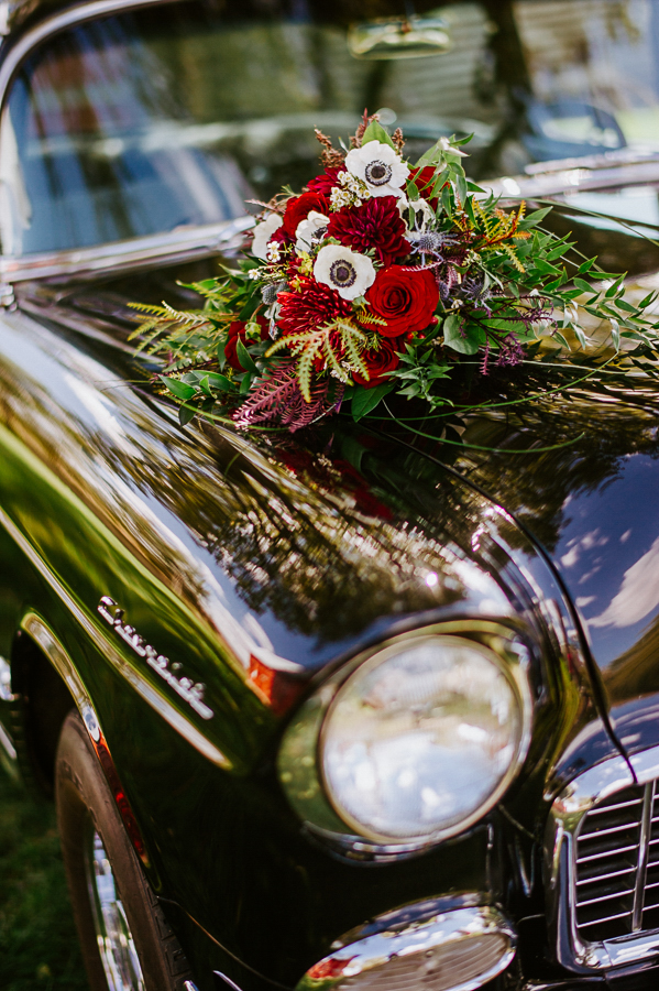 Classic car and bridal bouquet