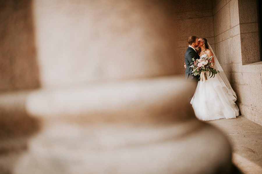 Granite pillar with bride and groom