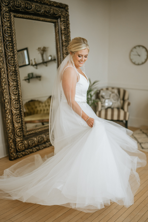 Bride twirling at the Capitol Room